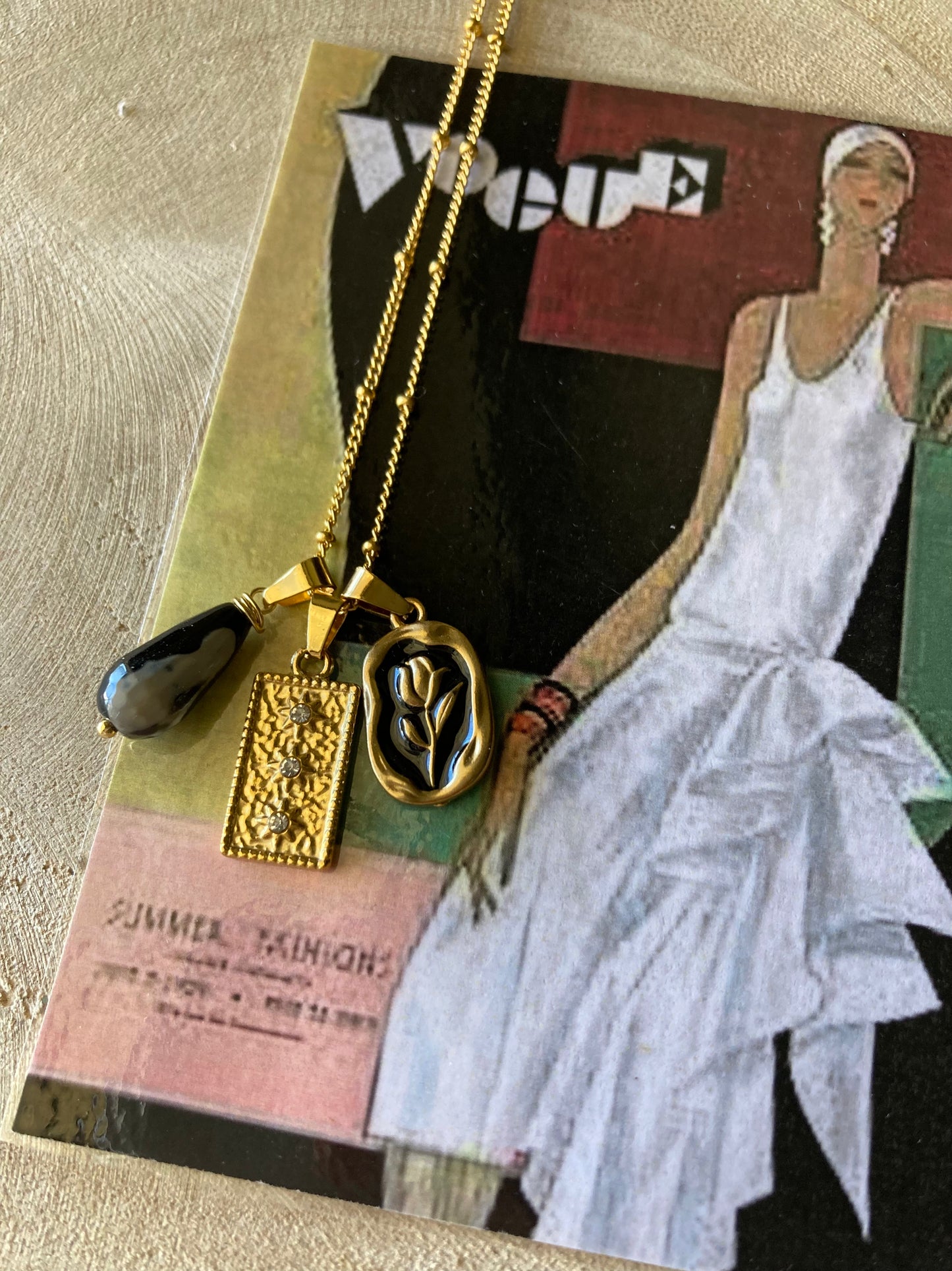 Collana in acciaio con tre pendenti