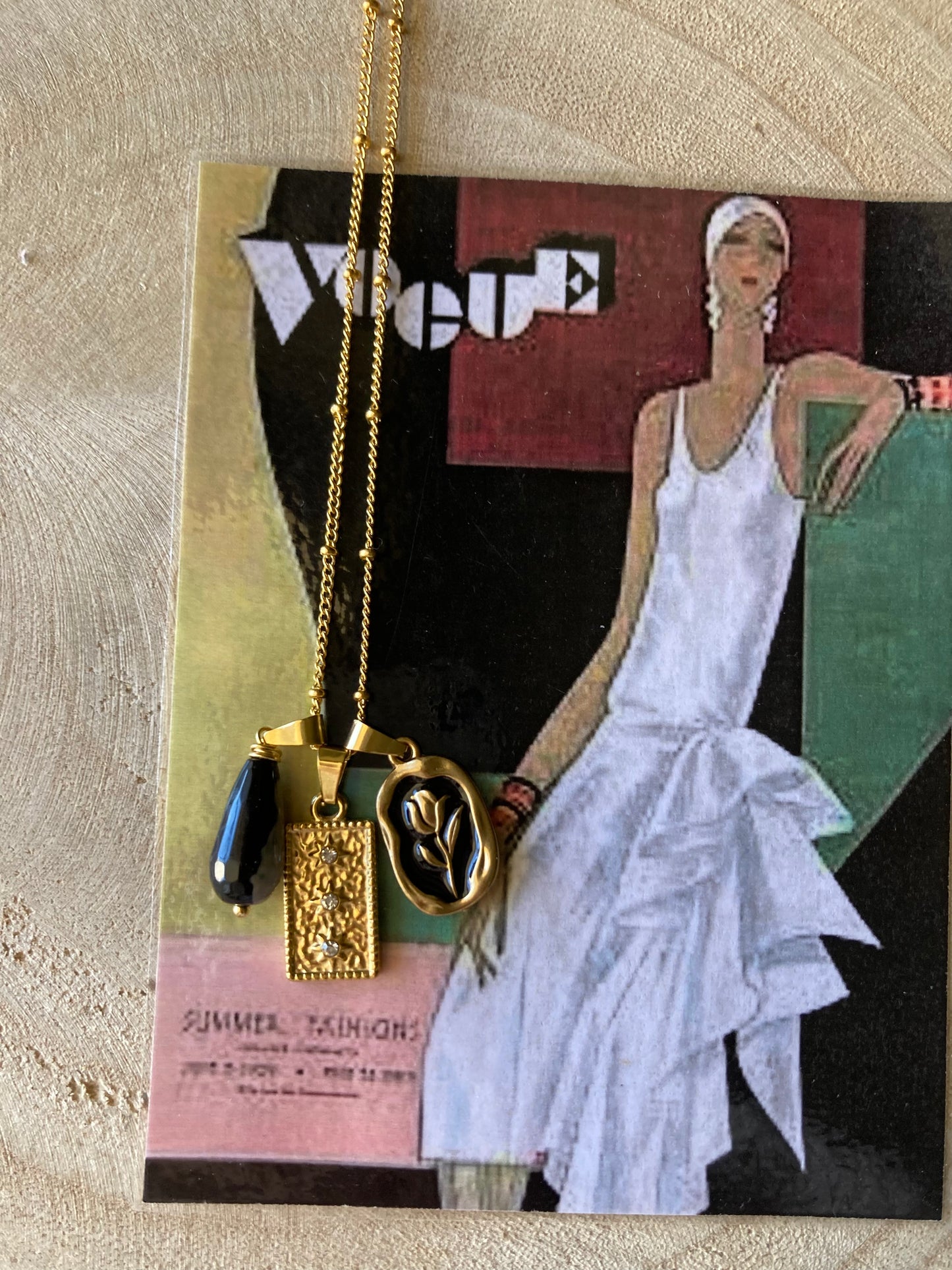 Collana in acciaio con tre pendenti