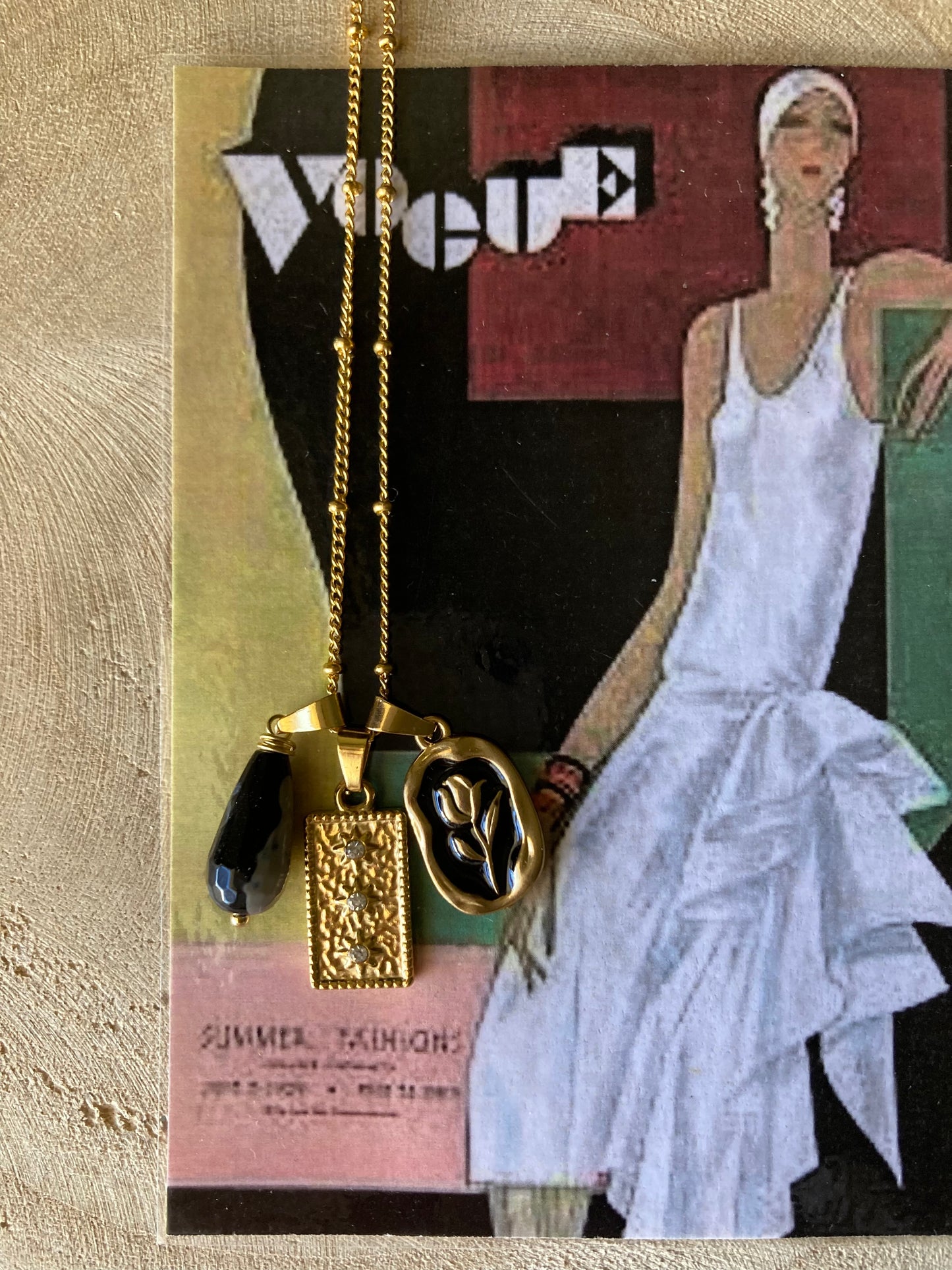 Collana in acciaio con tre pendenti