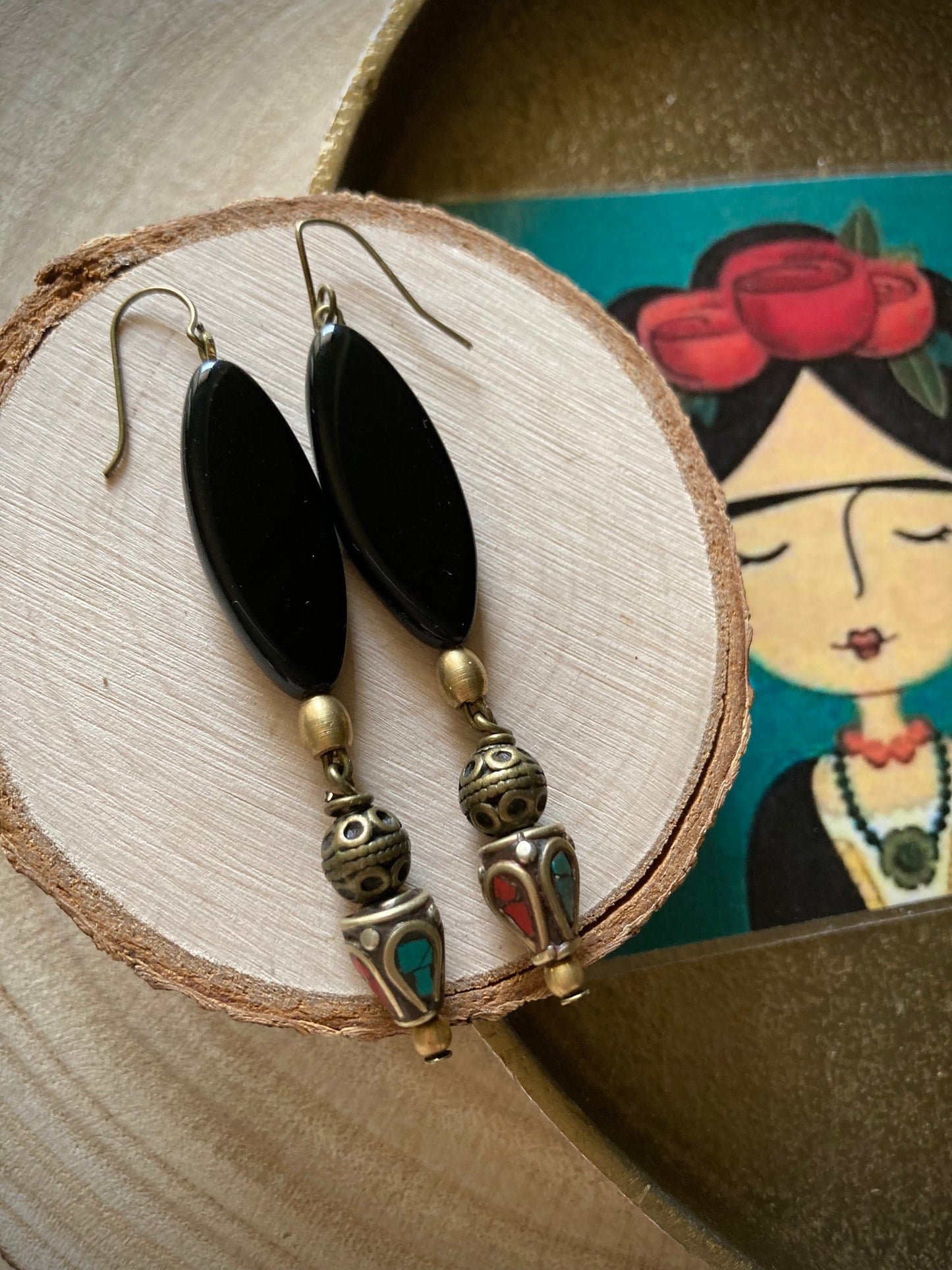 Orecchini pendenti pezzo unico