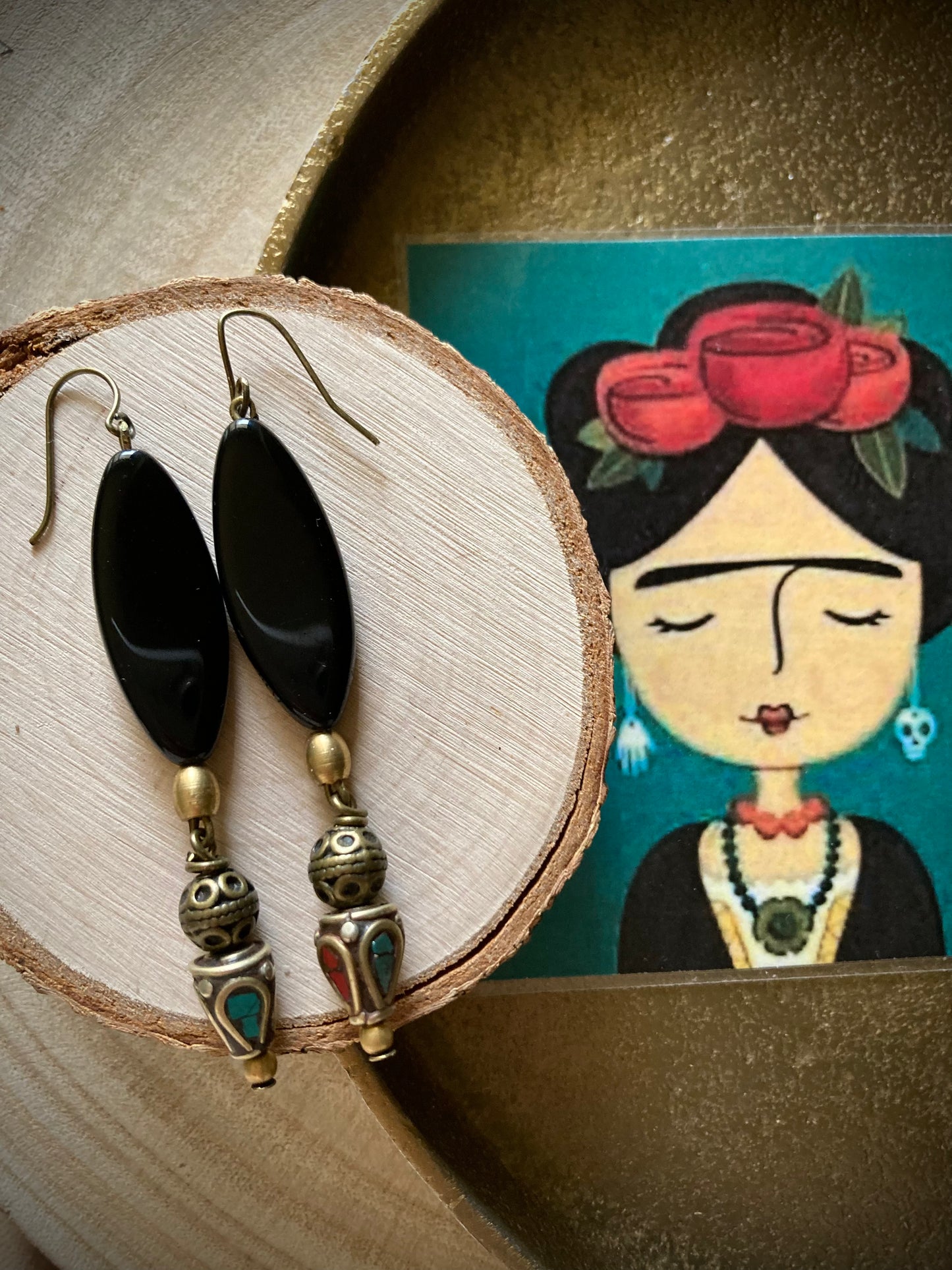 Orecchini pendenti pezzo unico