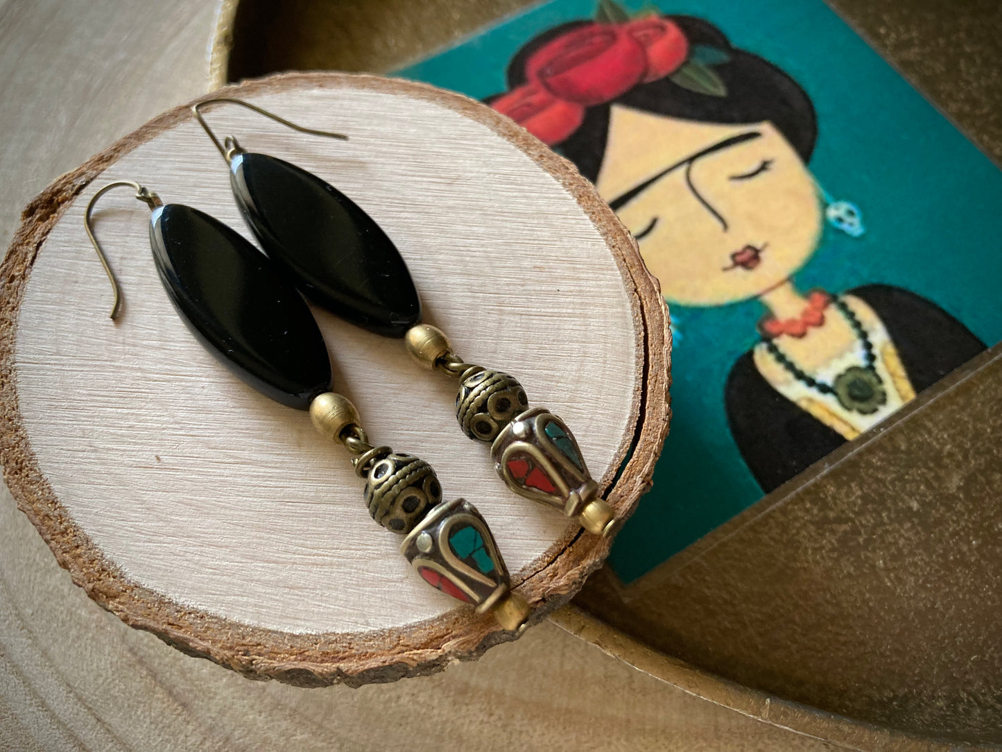 Orecchini pendenti pezzo unico