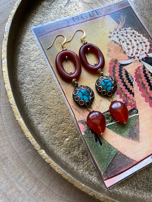 Orecchini pendenti pezzo unico