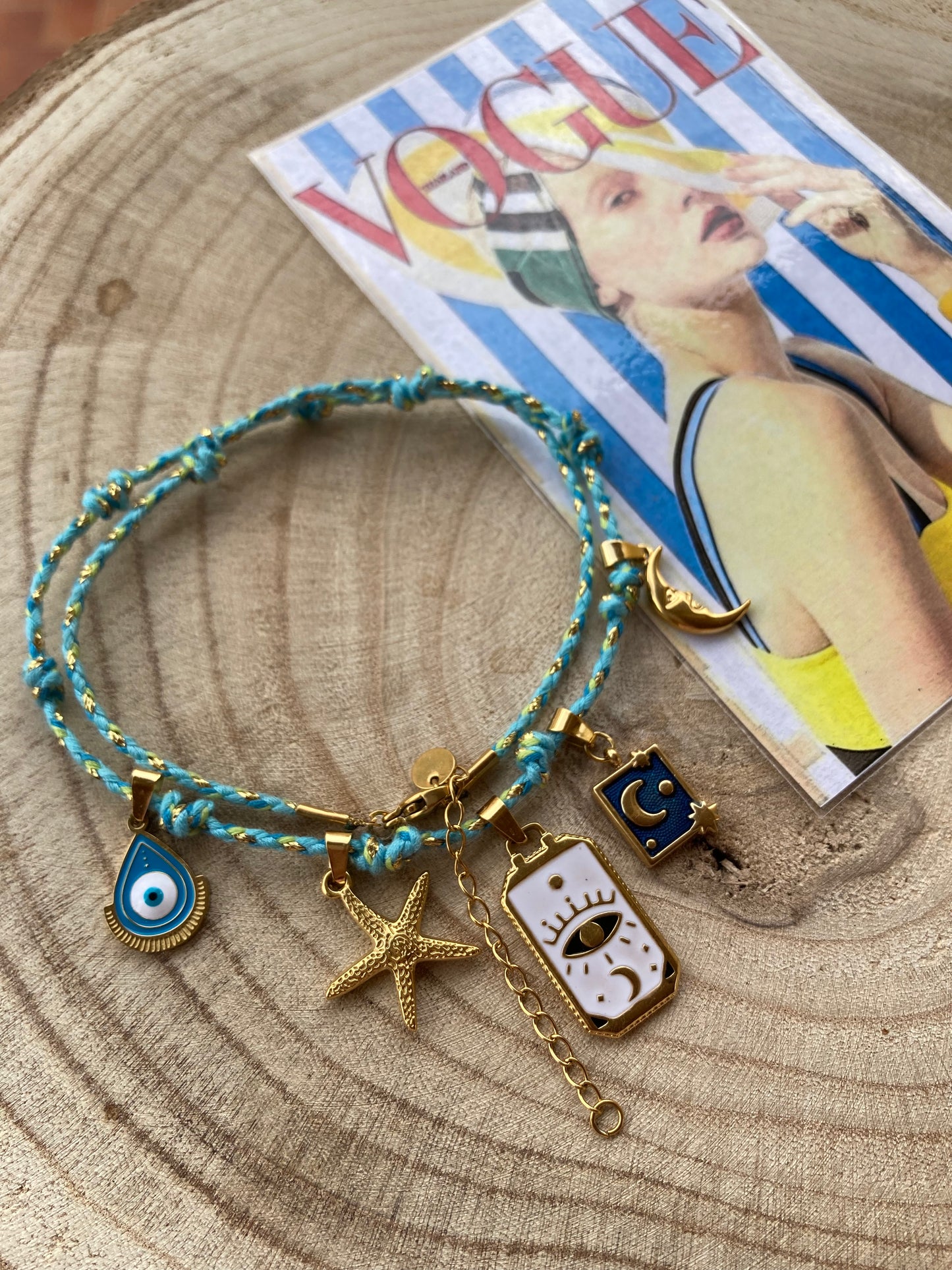 Collanina Kora con cordino azzurro 5 pendenti